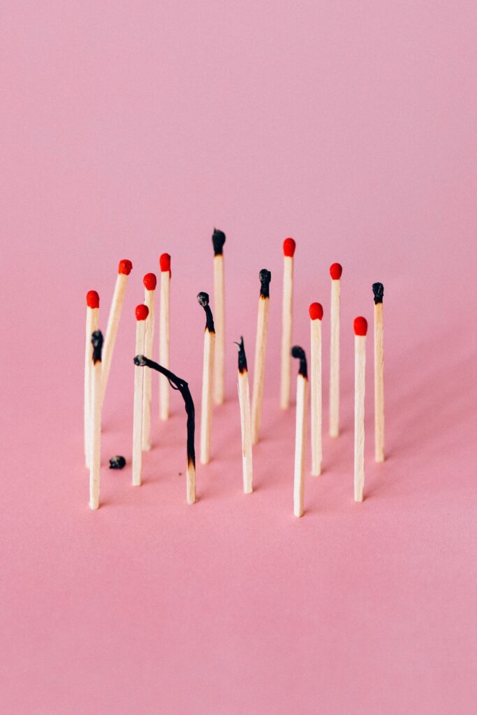 matches standing upright, some burnt others intact