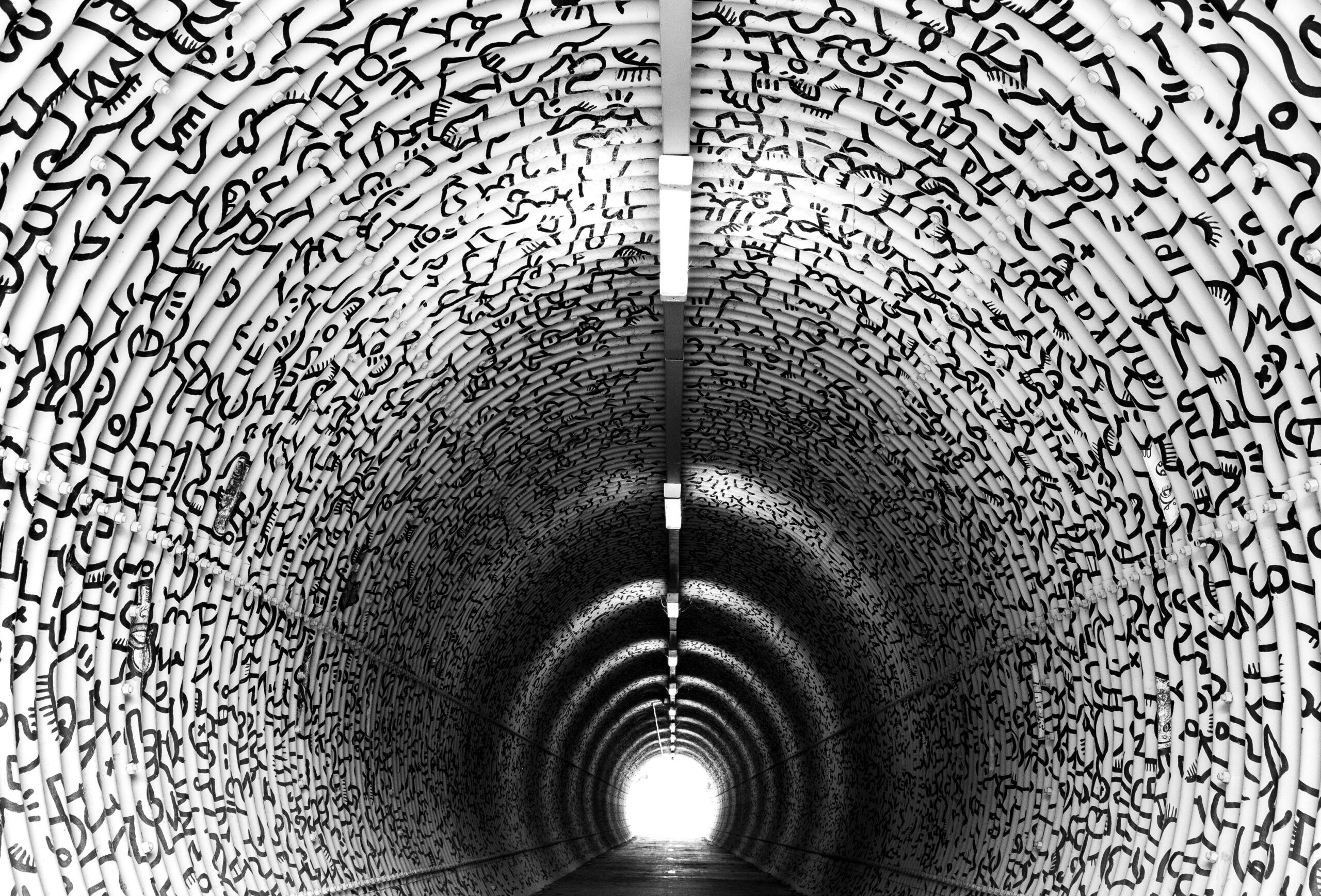Image of tunnel in black and white.